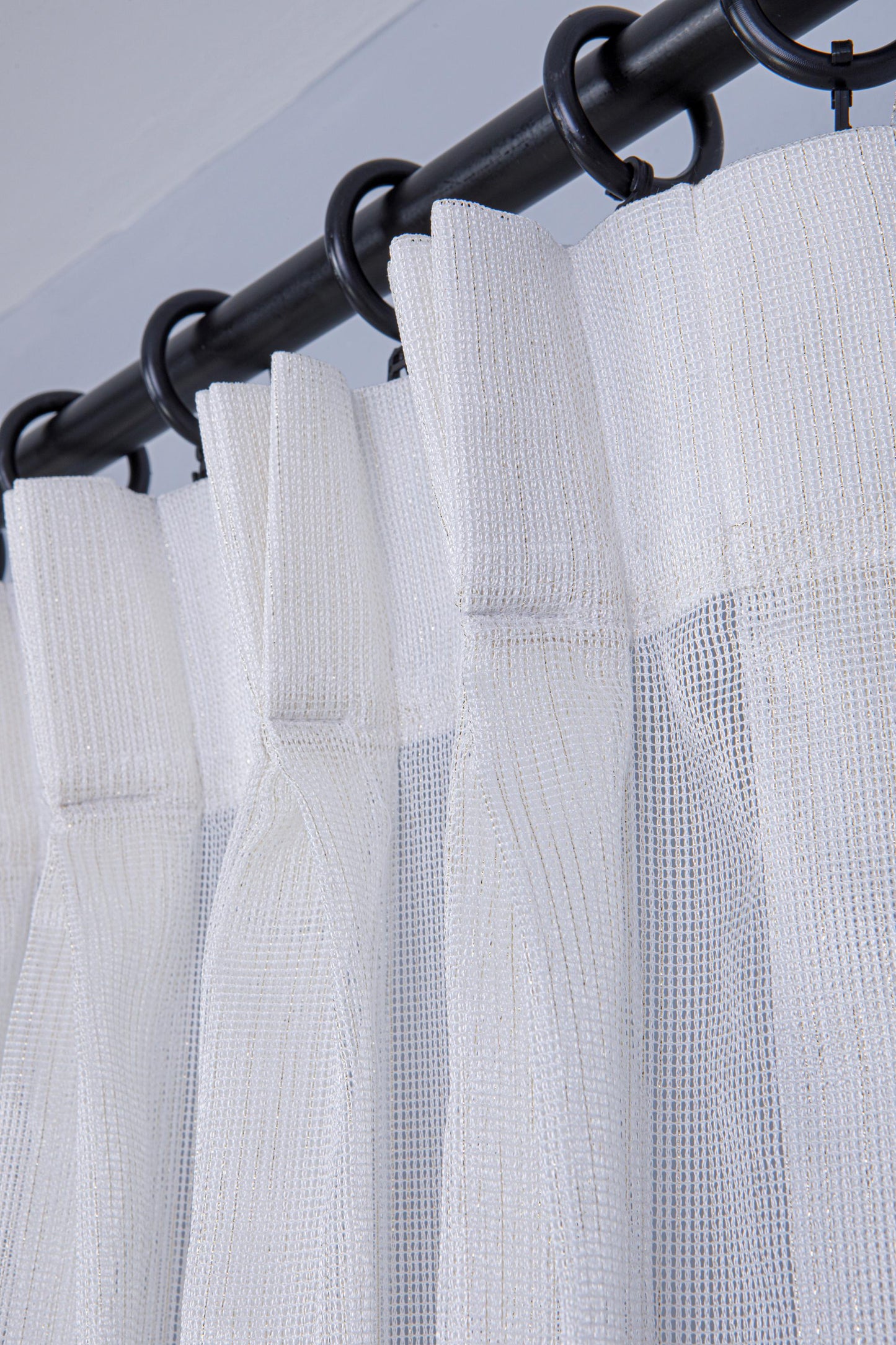Pinch Pleated Sheer Curtains: Adjustable Height Hooks